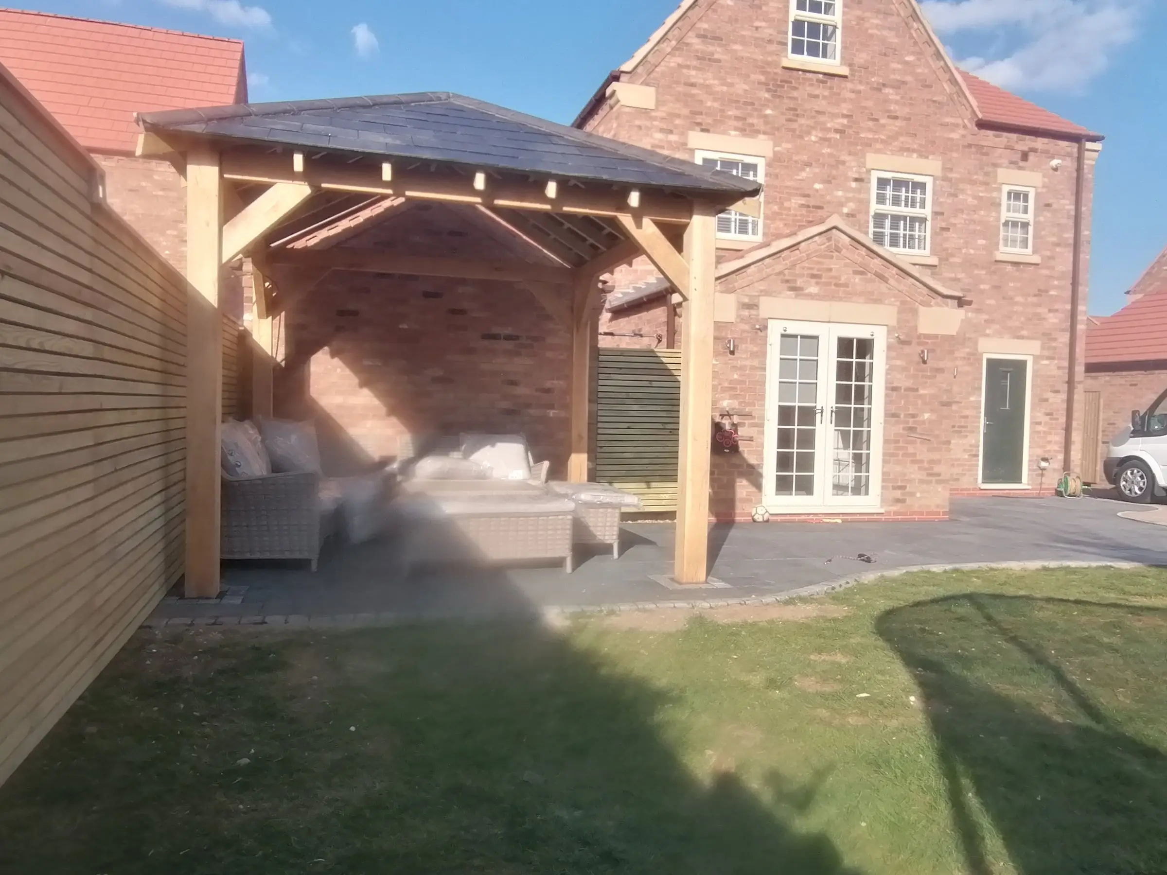Oak gazebo and slate patio