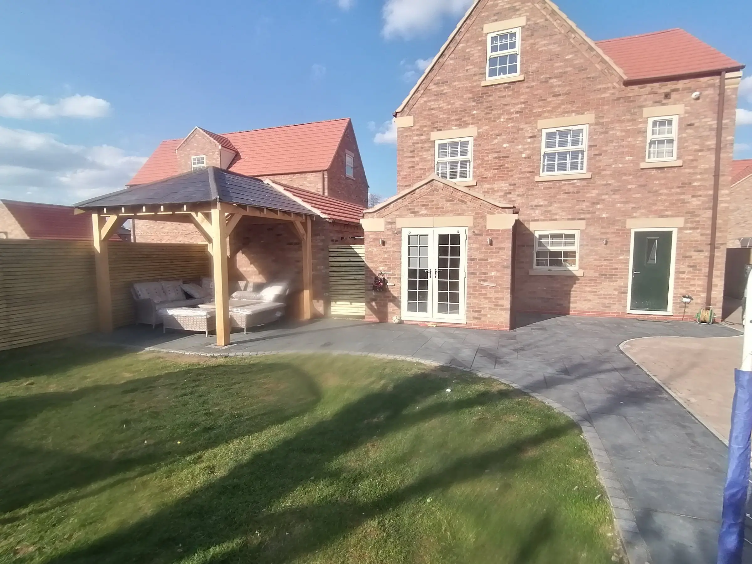 Oak gazebo and slate patio