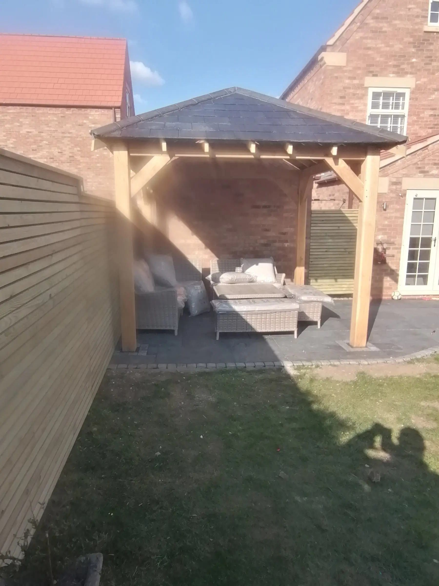 Oak gazebo and slate patio
