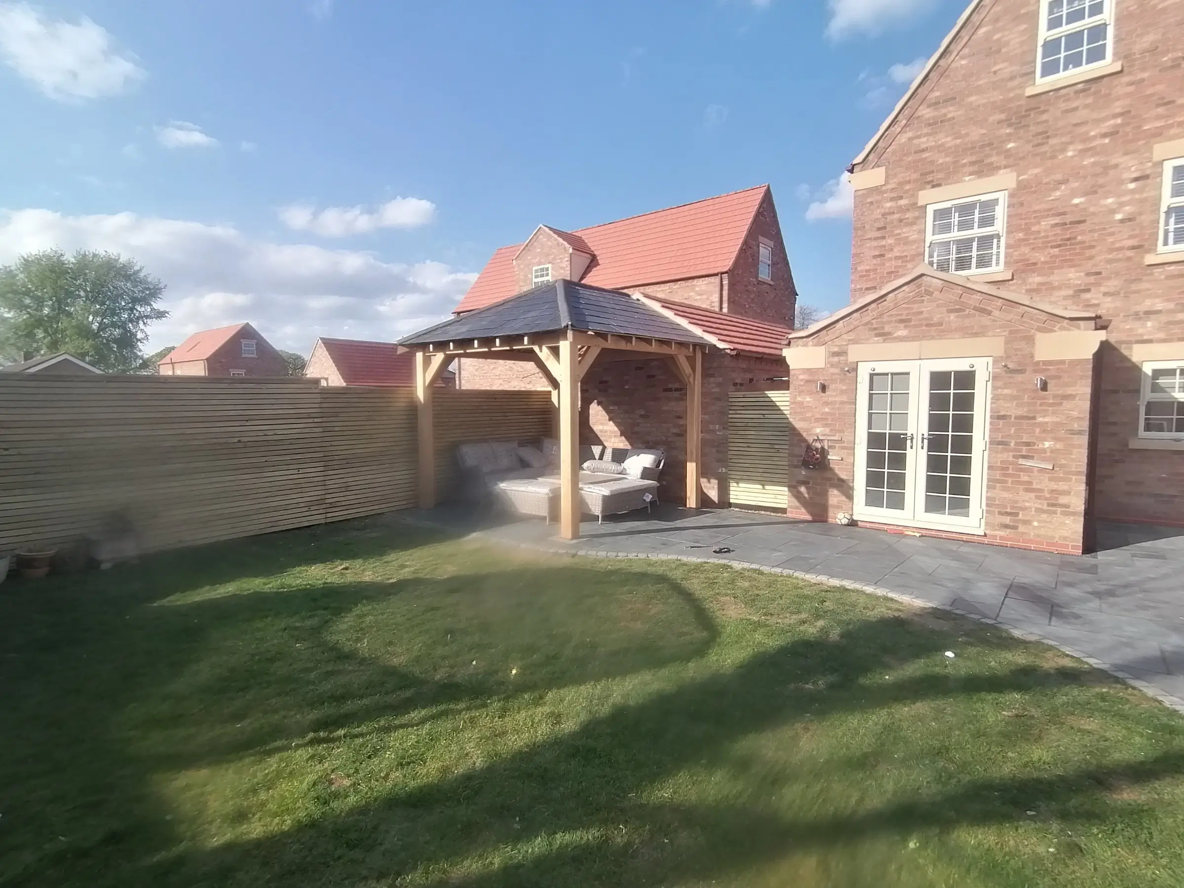 Oak gazebo and slate patio
