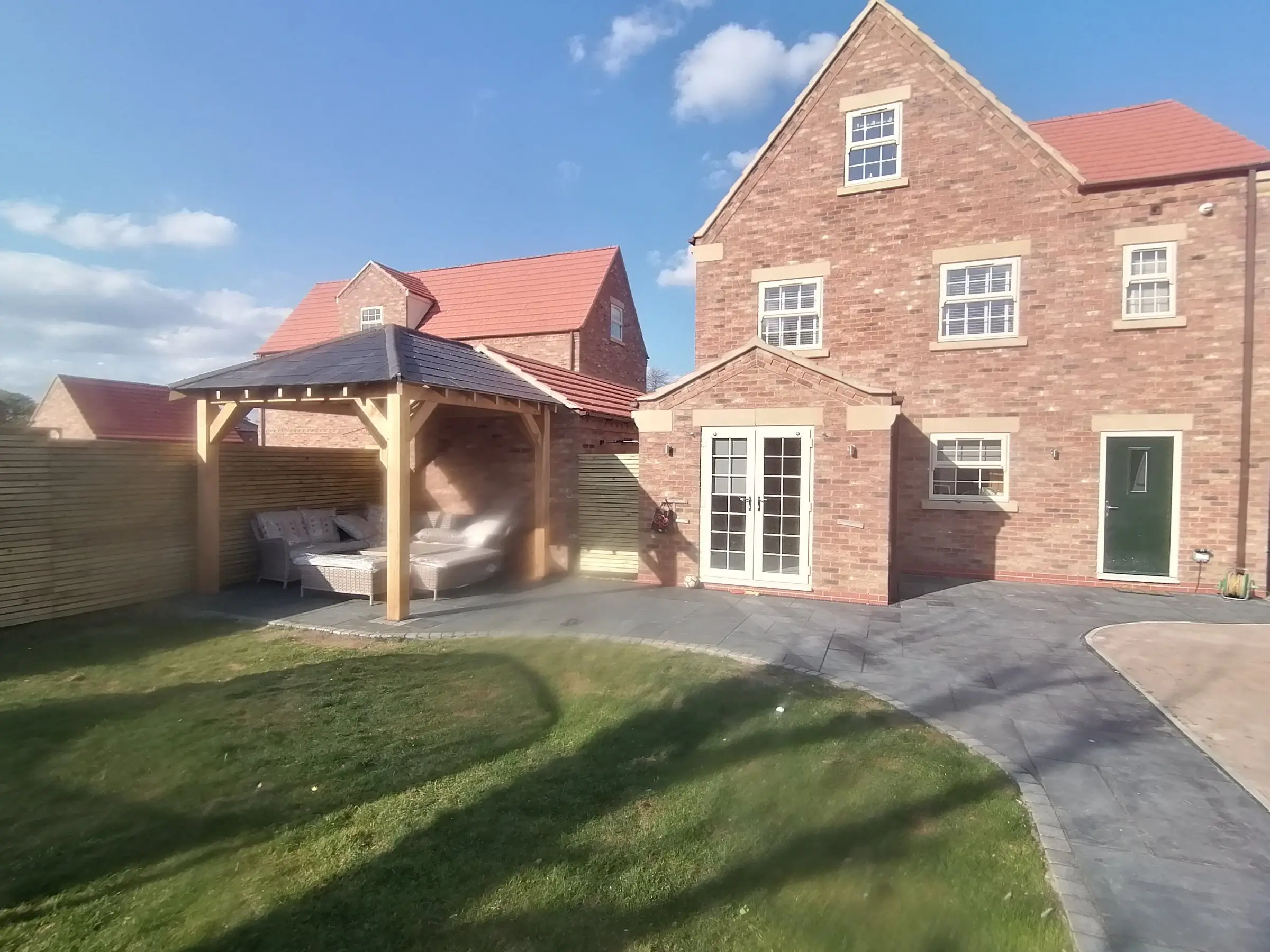 Oak gazebo and slate patio