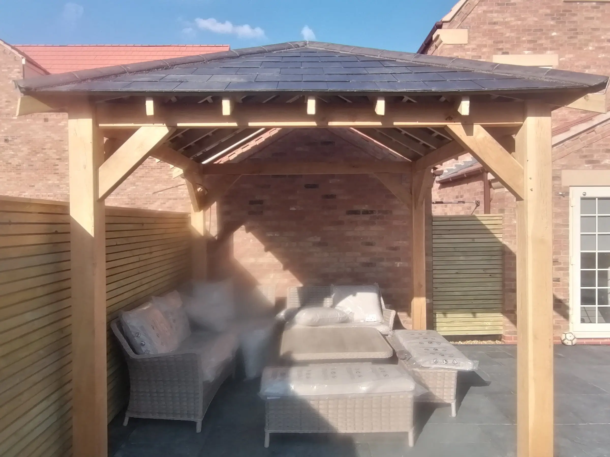Oak gazebo and slate patio