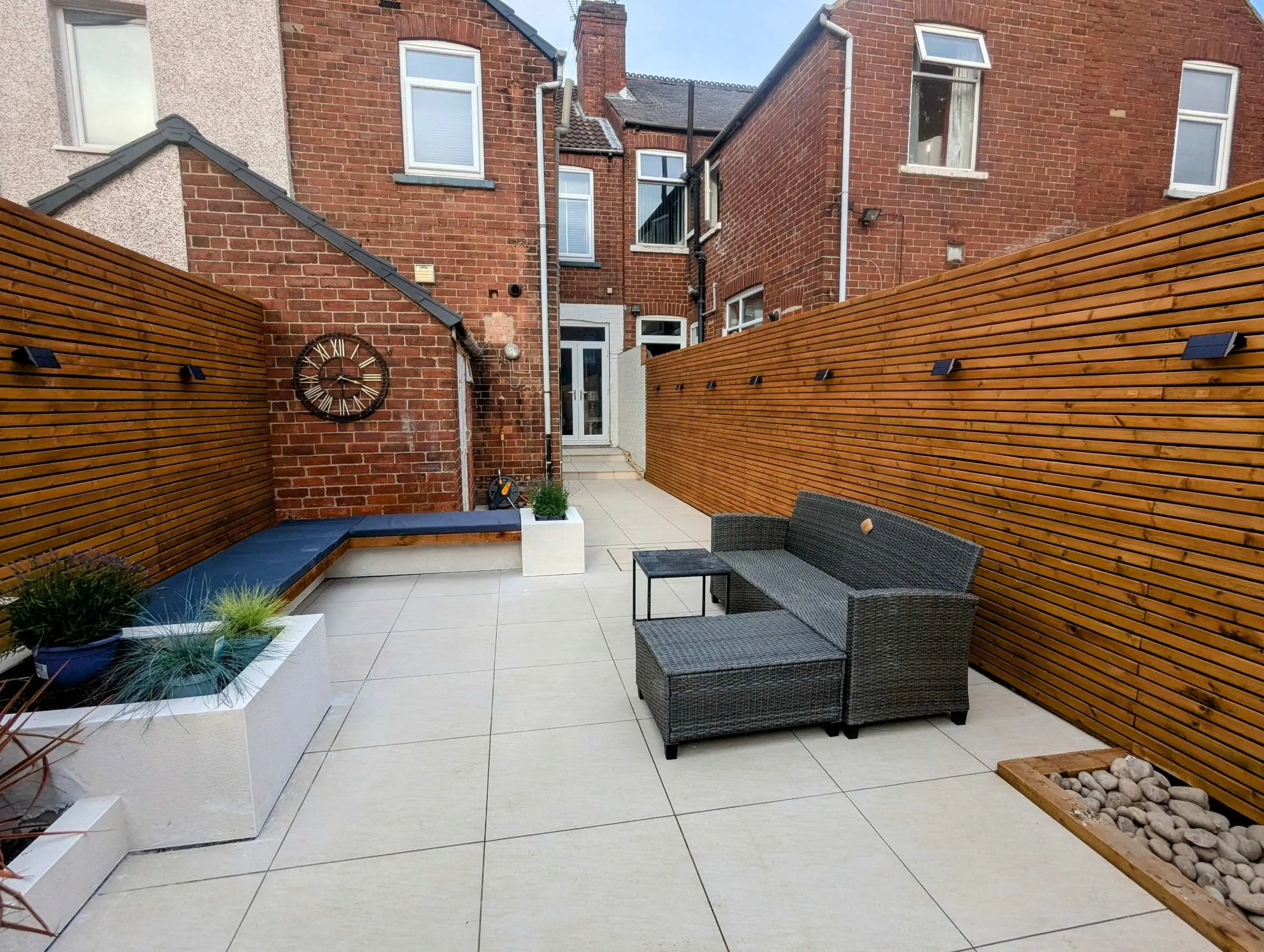New porcelain patio and timber fencing