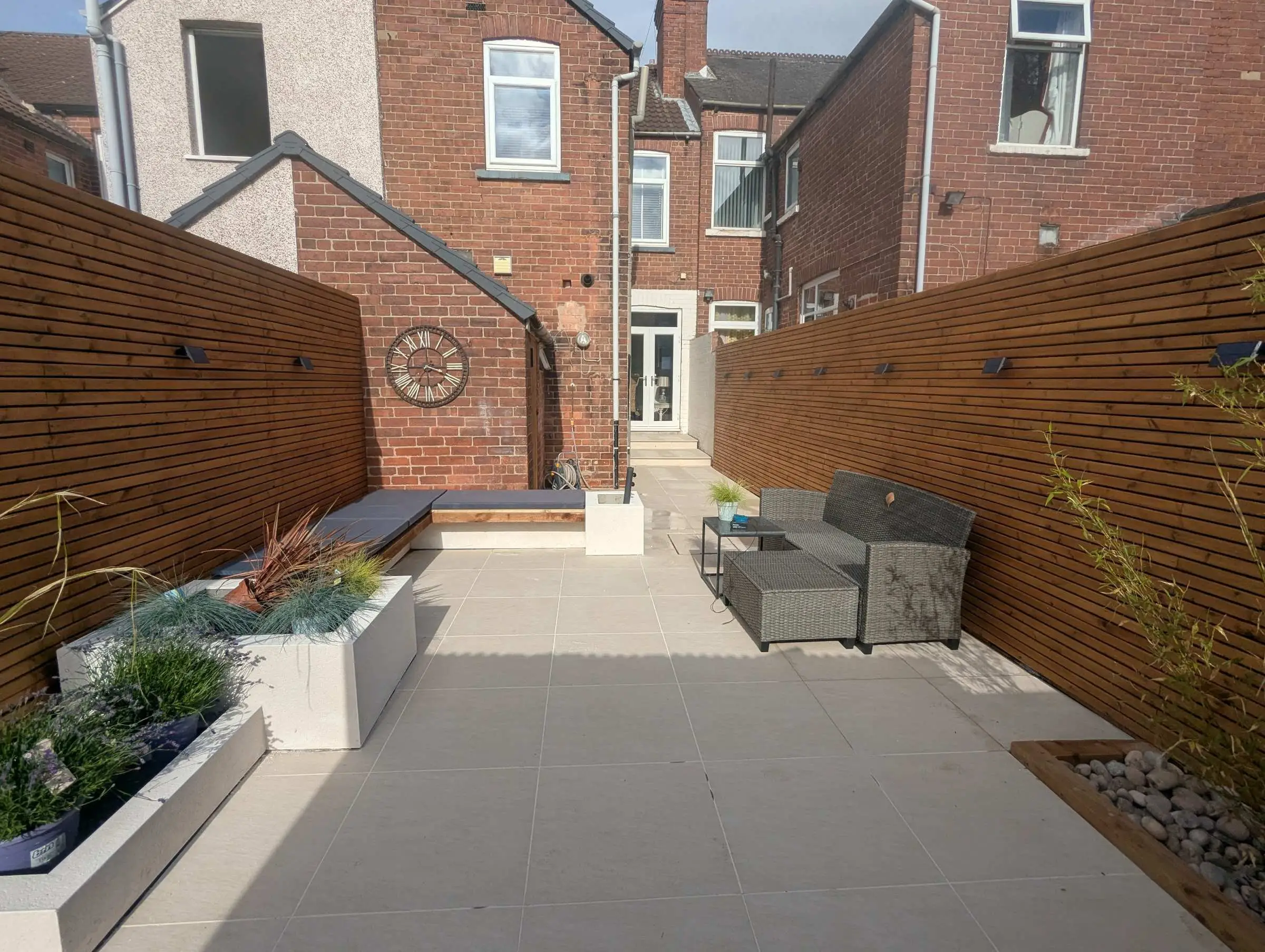 Porcelain patio and built-in planters
