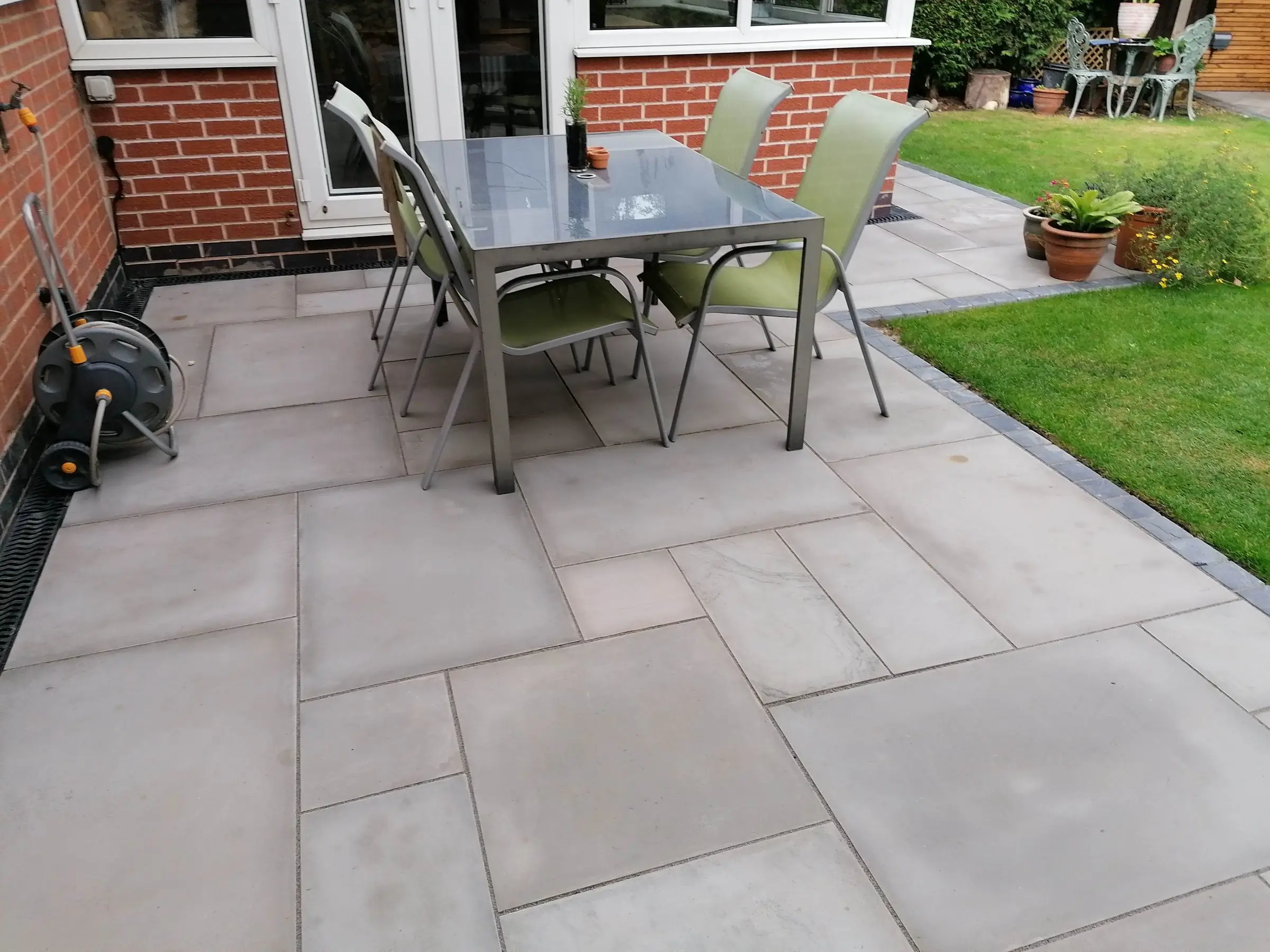 Garden redesign with bespoke timber structures and paving