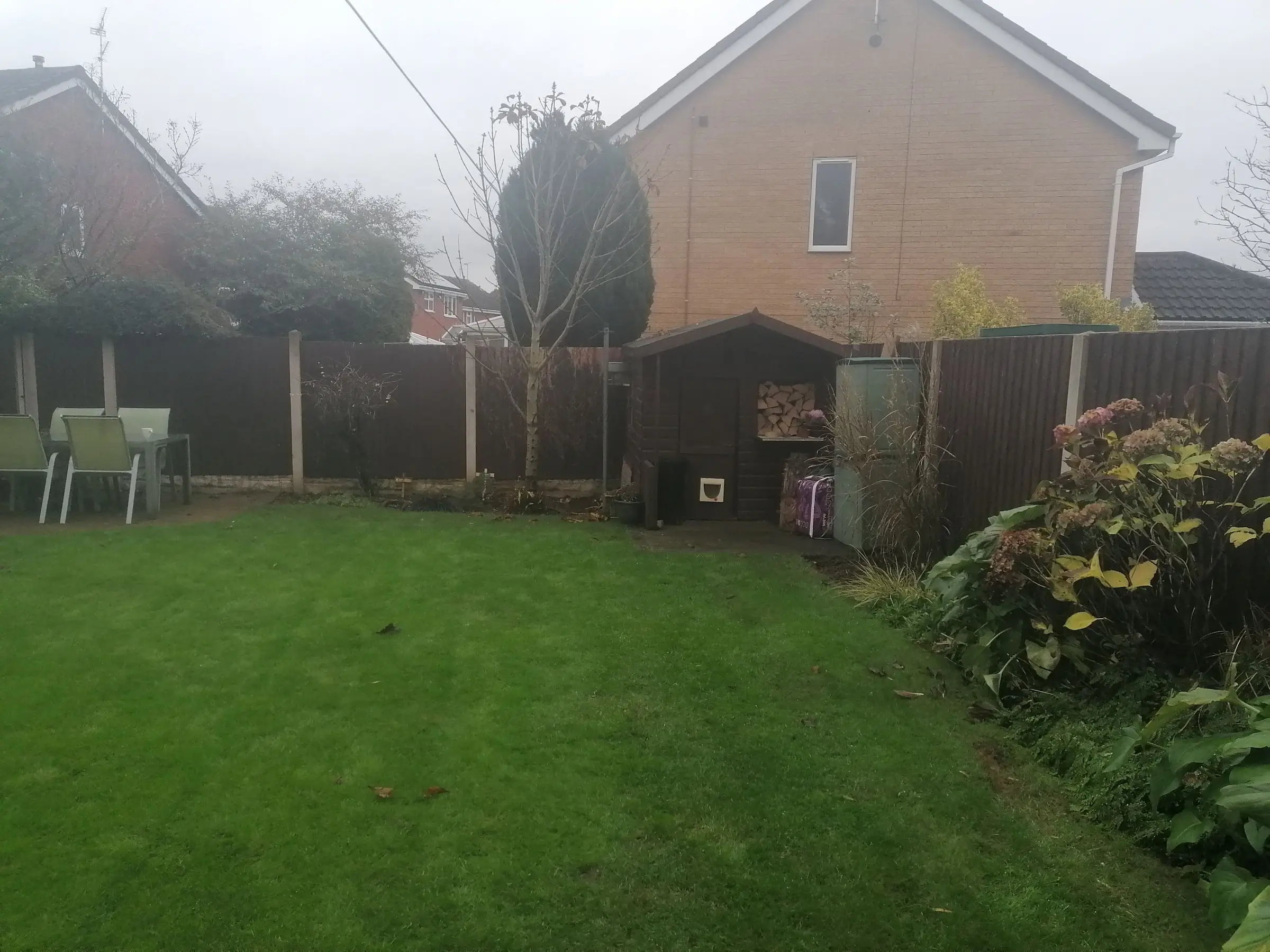 Garden redesign with bespoke timber structures and paving