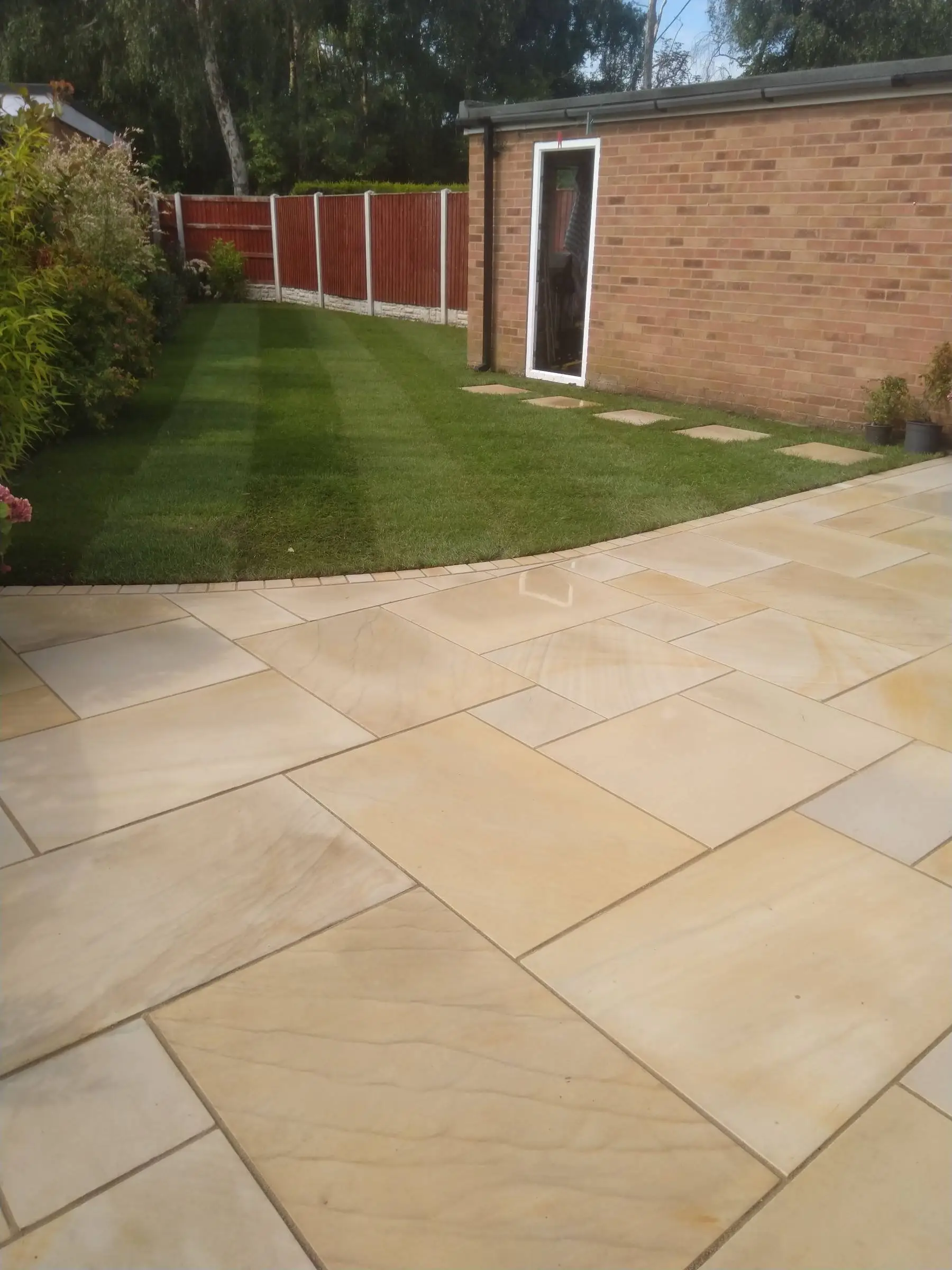 Cream Indian honed sandstone patio and lawn
