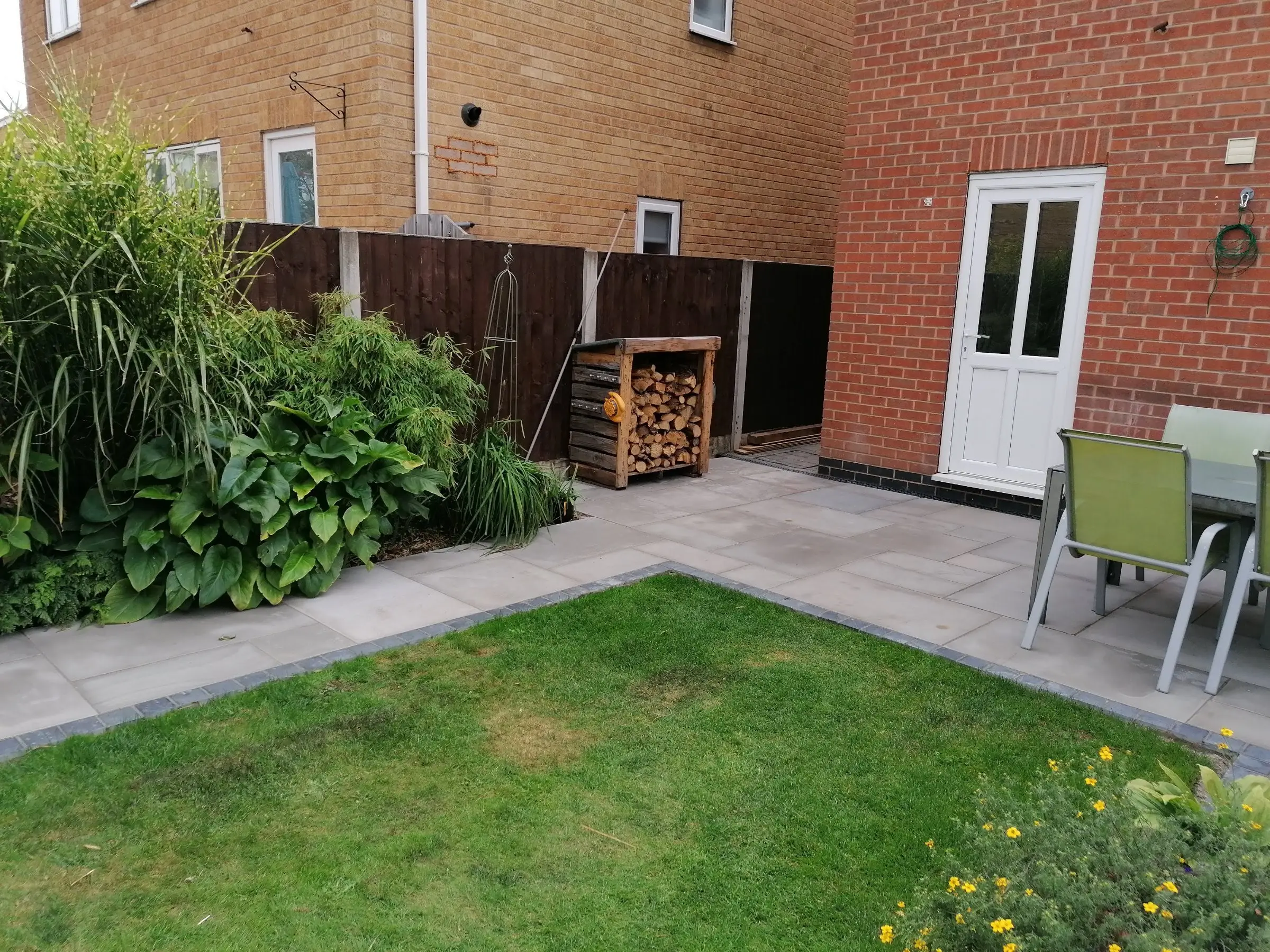 Garden redesign with bespoke timber structures and paving