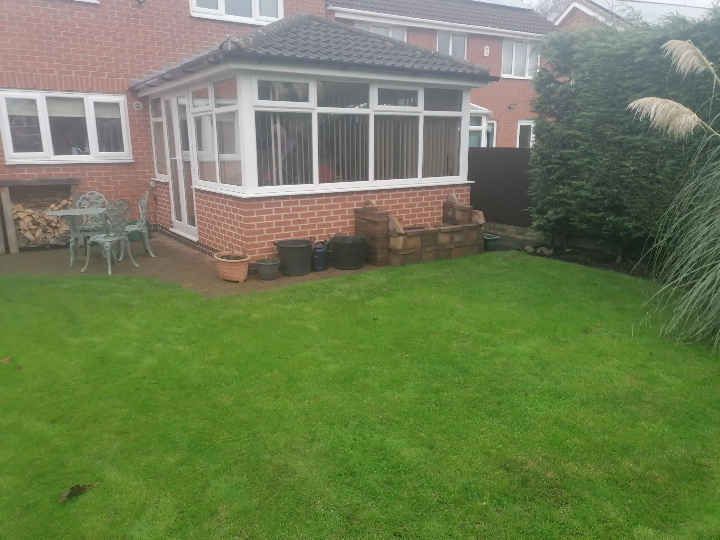 Garden redesign with bespoke timber structures and paving