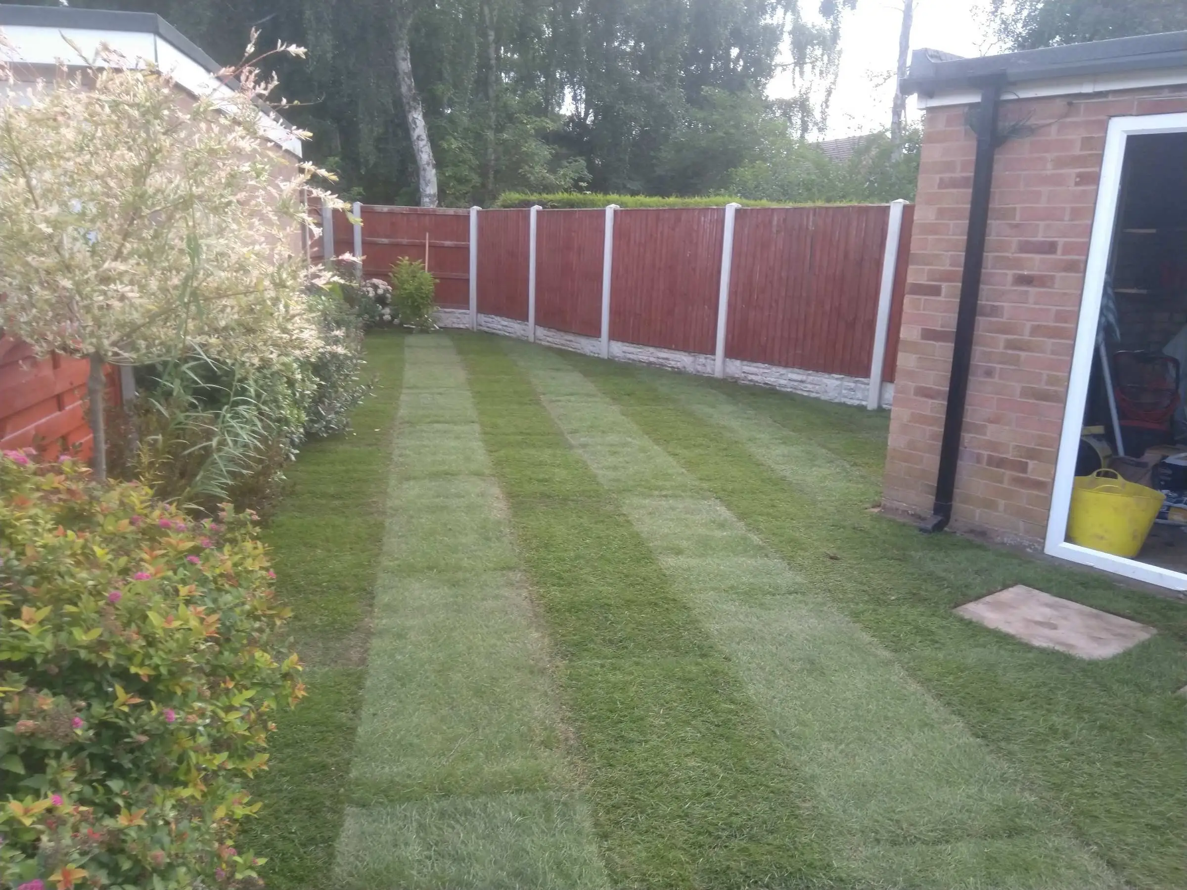 Cream Indian honed sandstone patio and lawn
