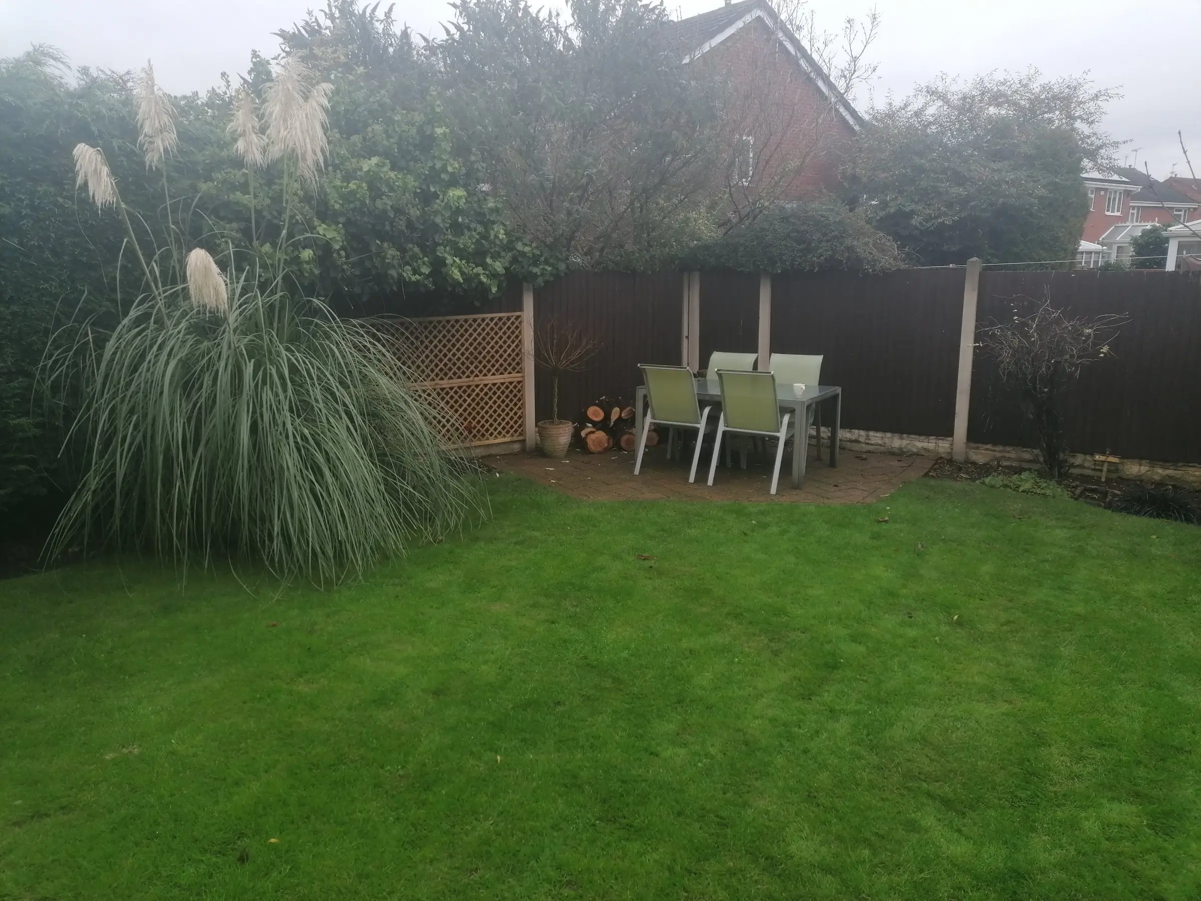 Garden redesign with bespoke timber structures and paving
