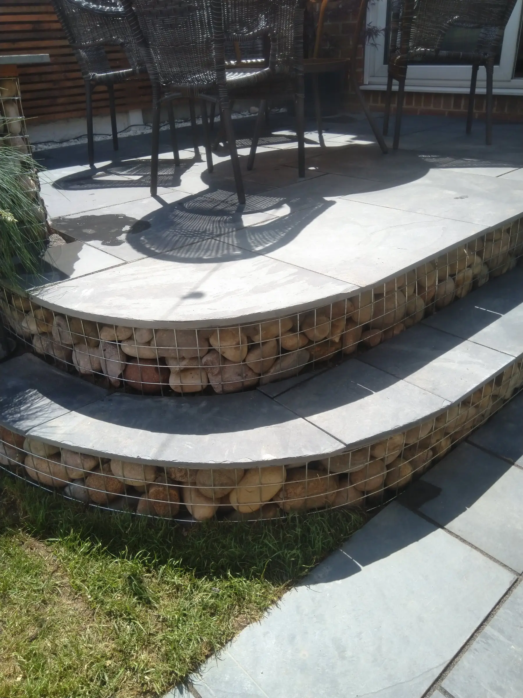 Scawsby small garden with gabion steps and water feature