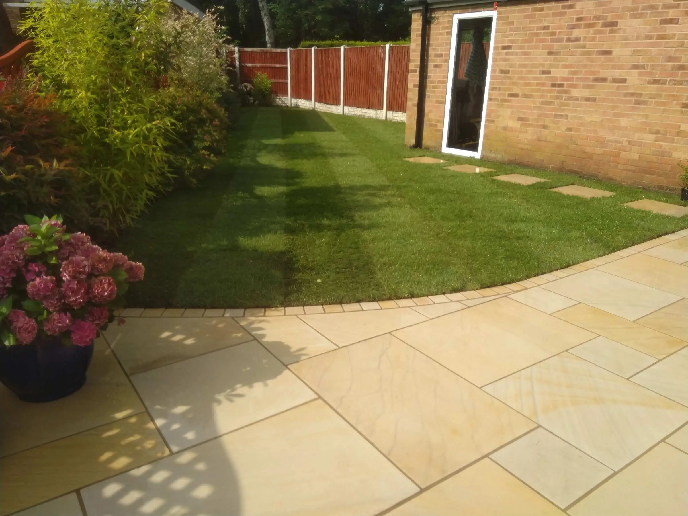 Cream Indian honed sandstone patio and lawn
