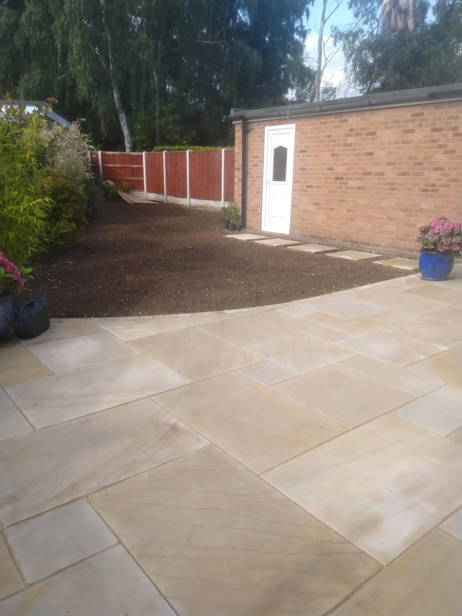 Cream Indian honed sandstone patio and lawn