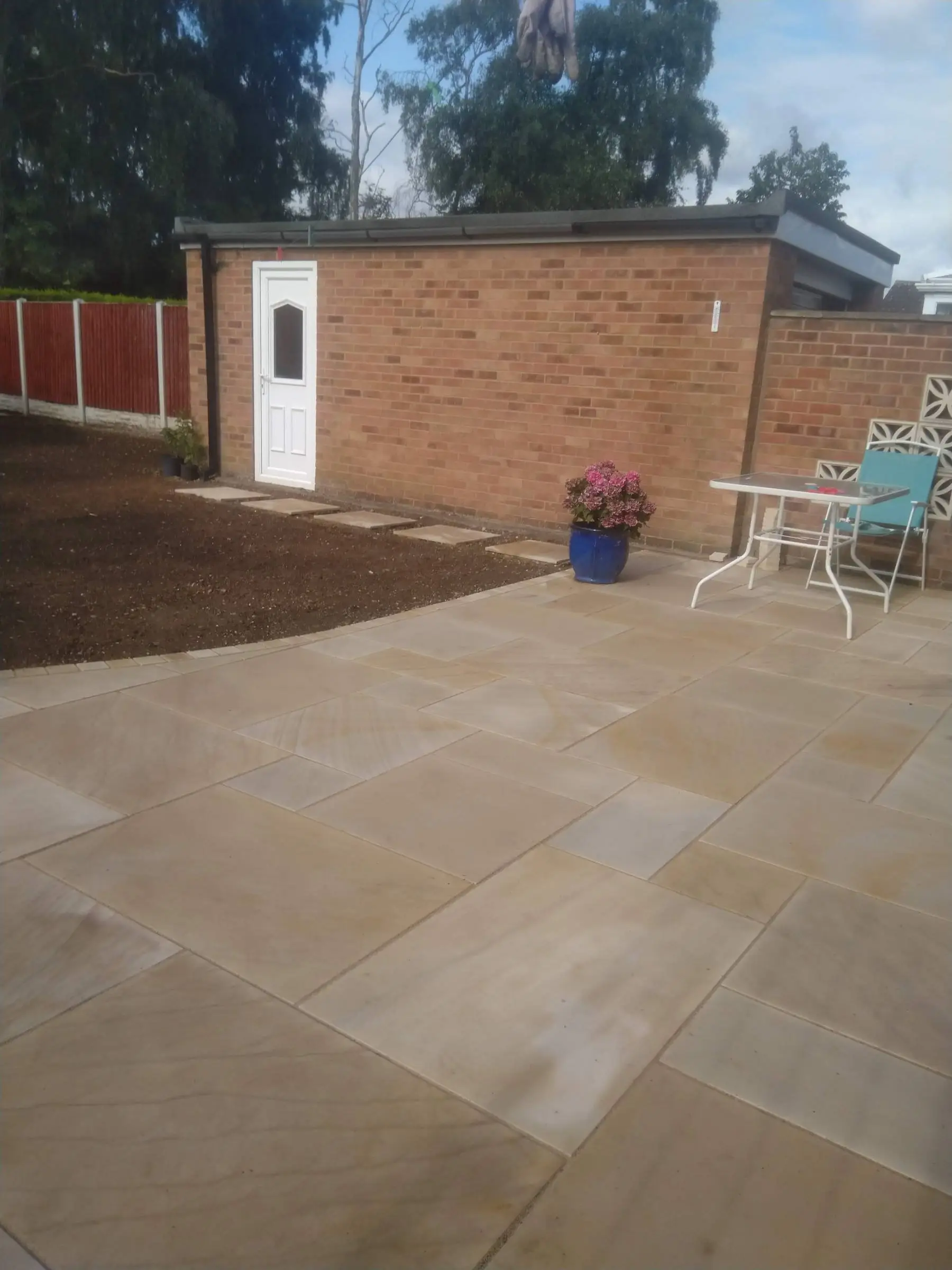 Cream Indian honed sandstone patio and lawn