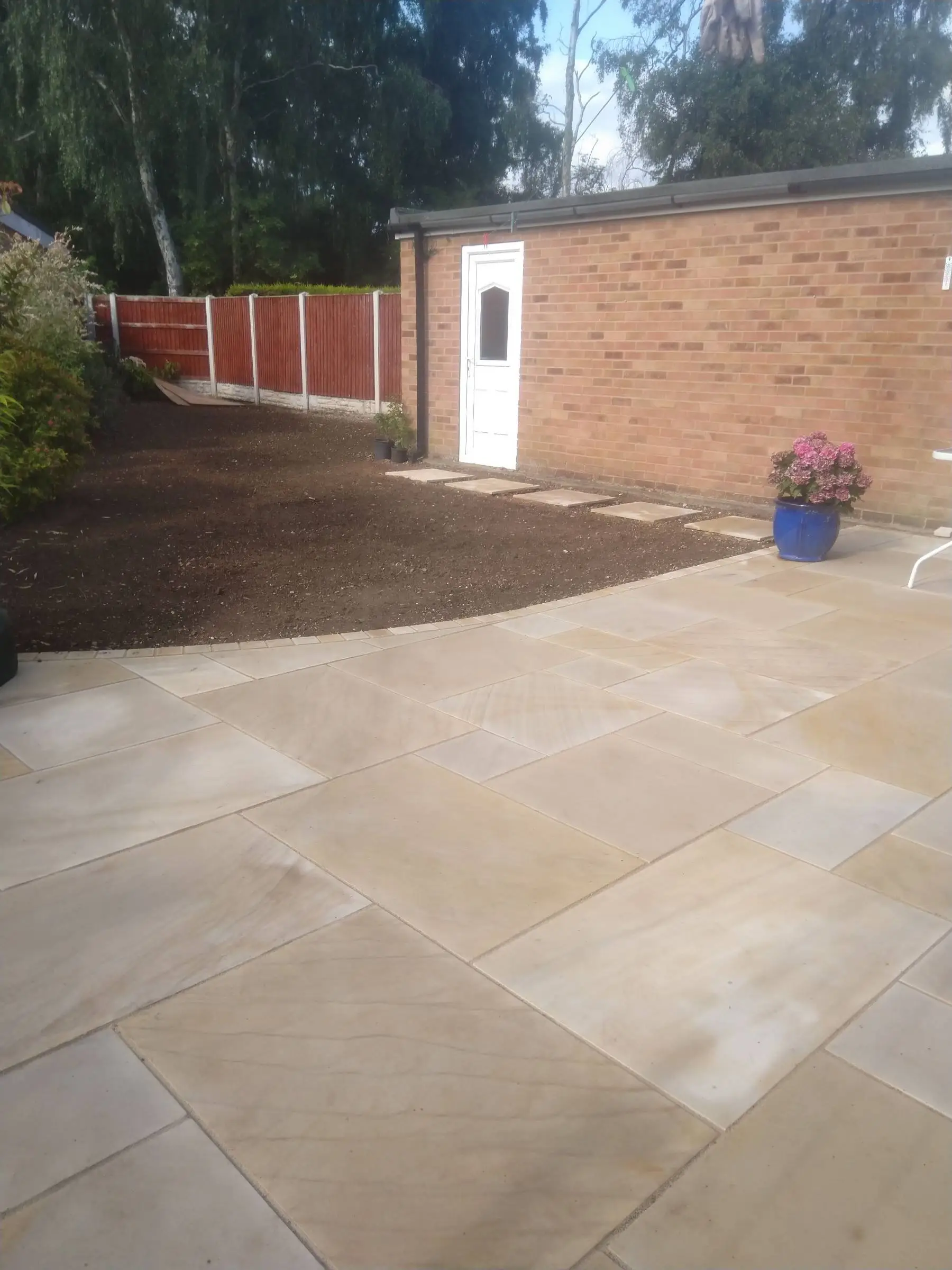 Cream Indian honed sandstone patio and lawn