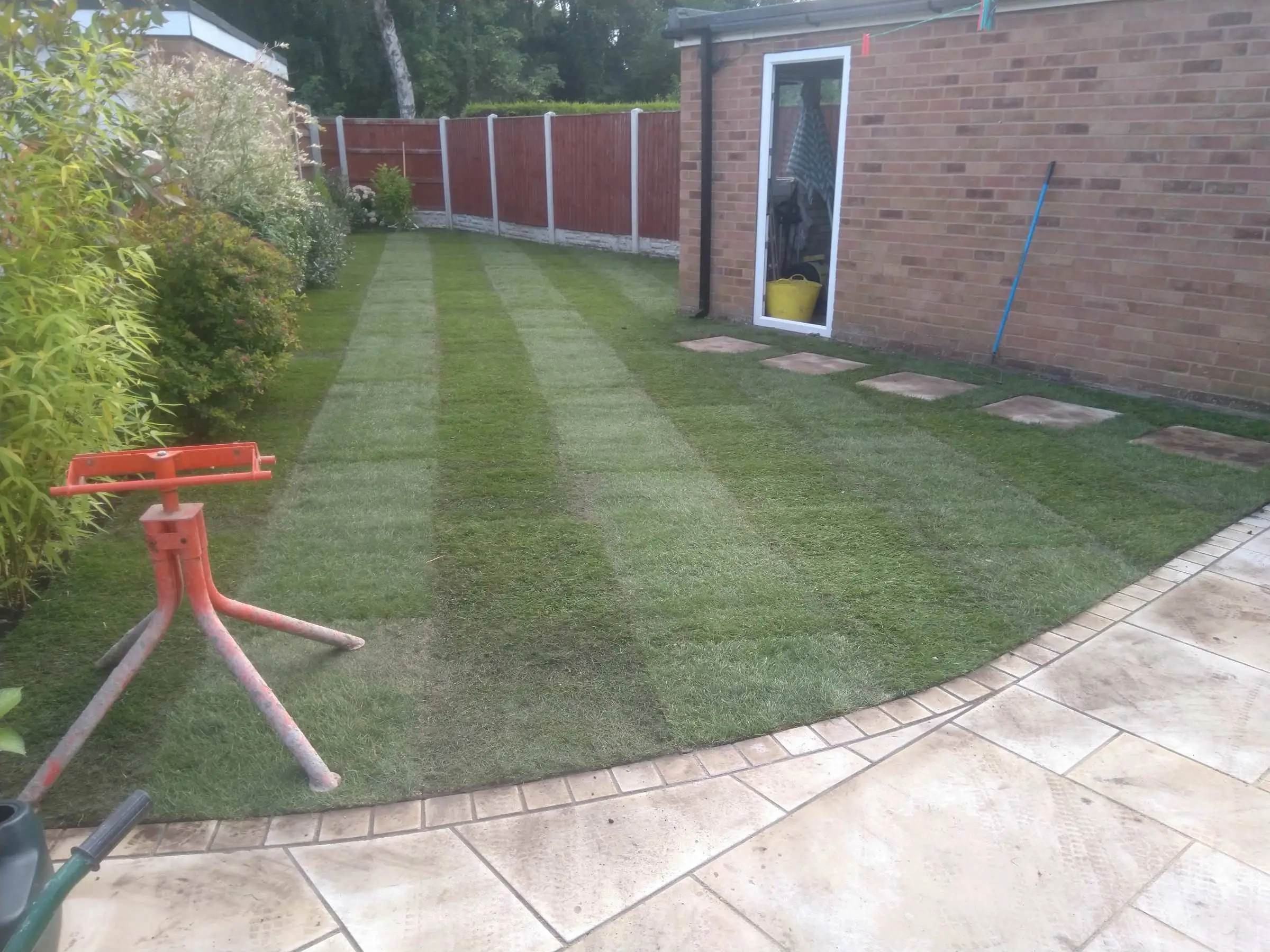 Cream Indian honed sandstone patio and lawn