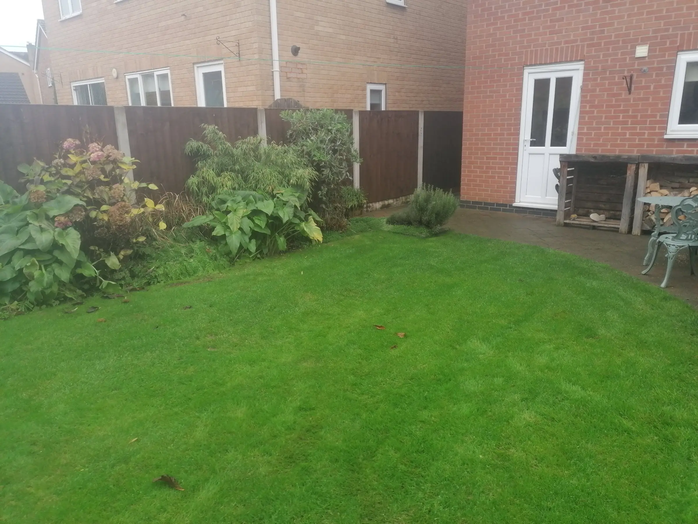 Garden redesign with bespoke timber structures and paving