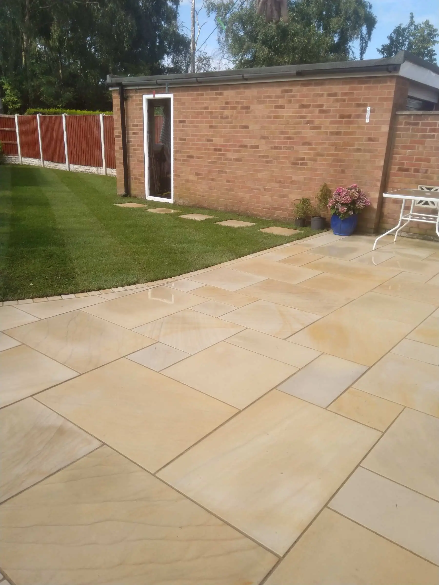 Cream Indian honed sandstone patio and lawn