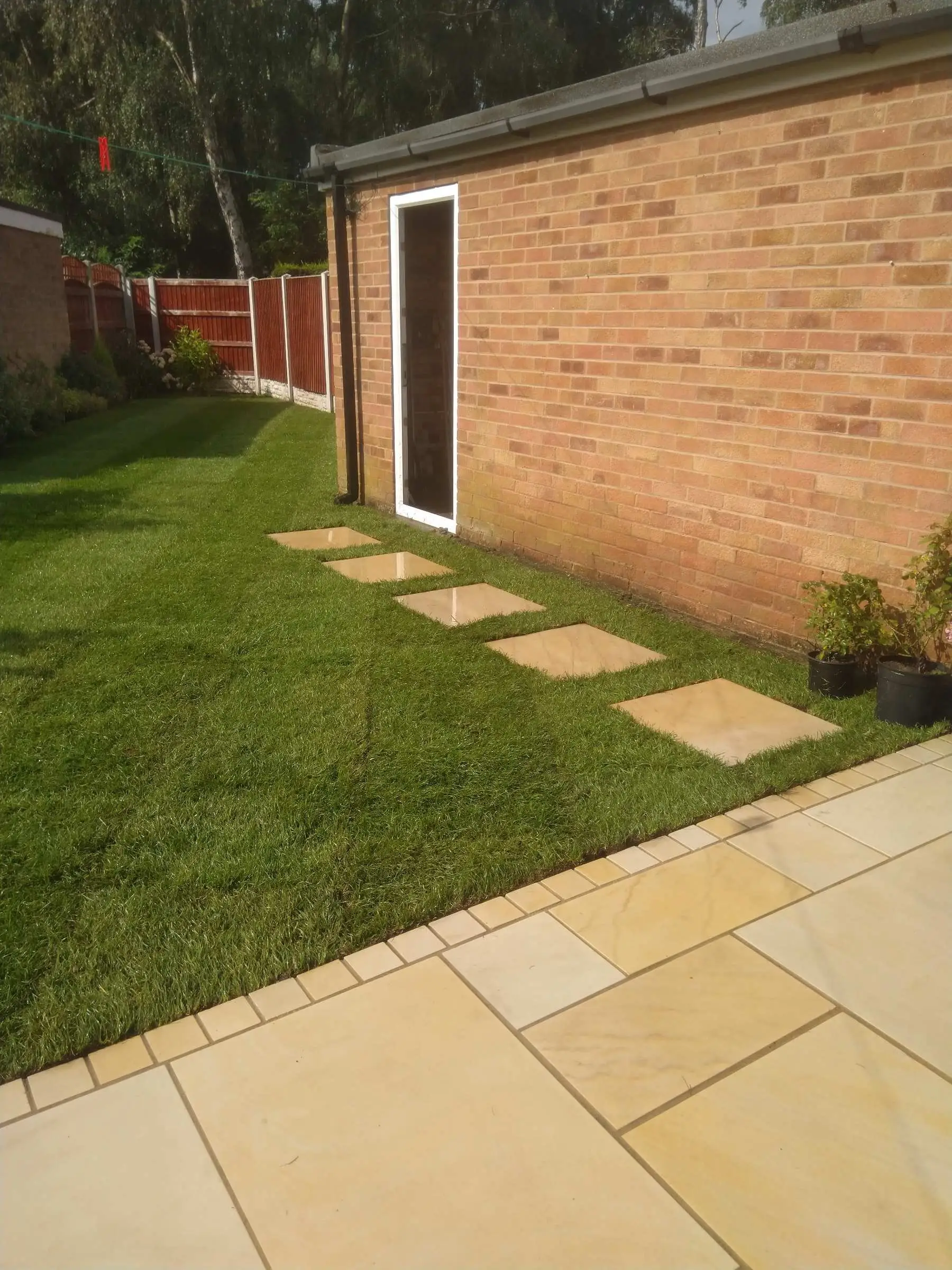 Cream Indian honed sandstone patio and lawn