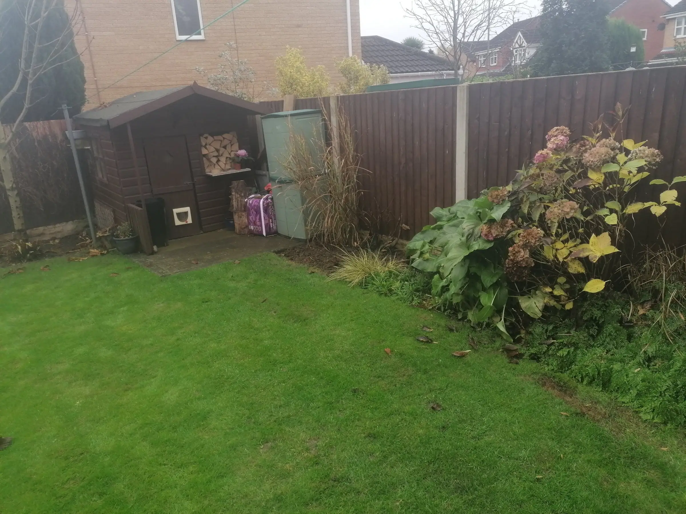 Garden redesign with bespoke timber structures and paving