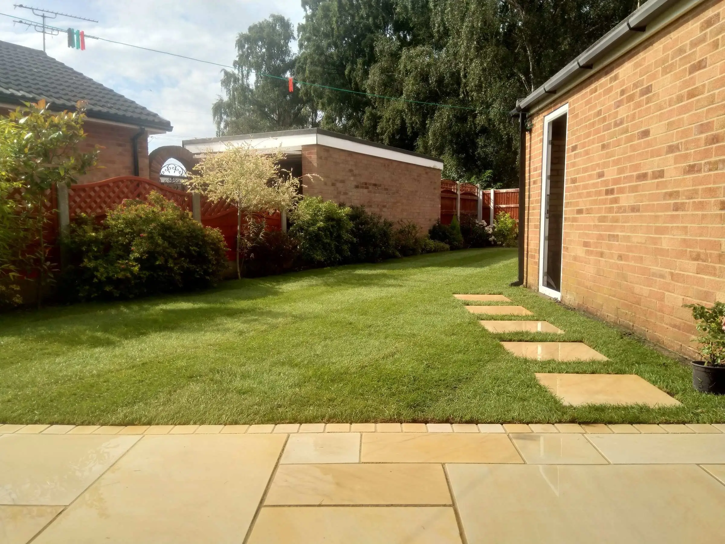 Cream Indian honed sandstone patio and lawn