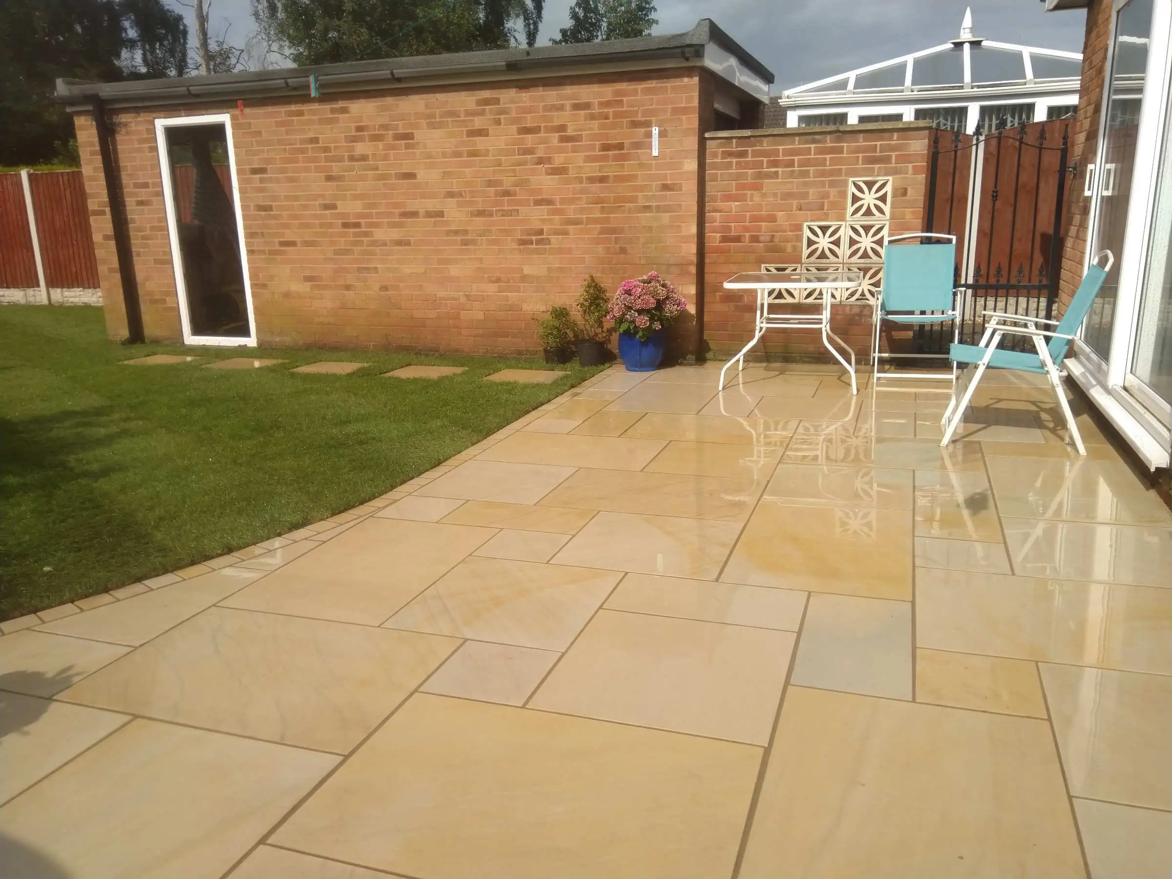 Cream Indian honed sandstone patio and lawn