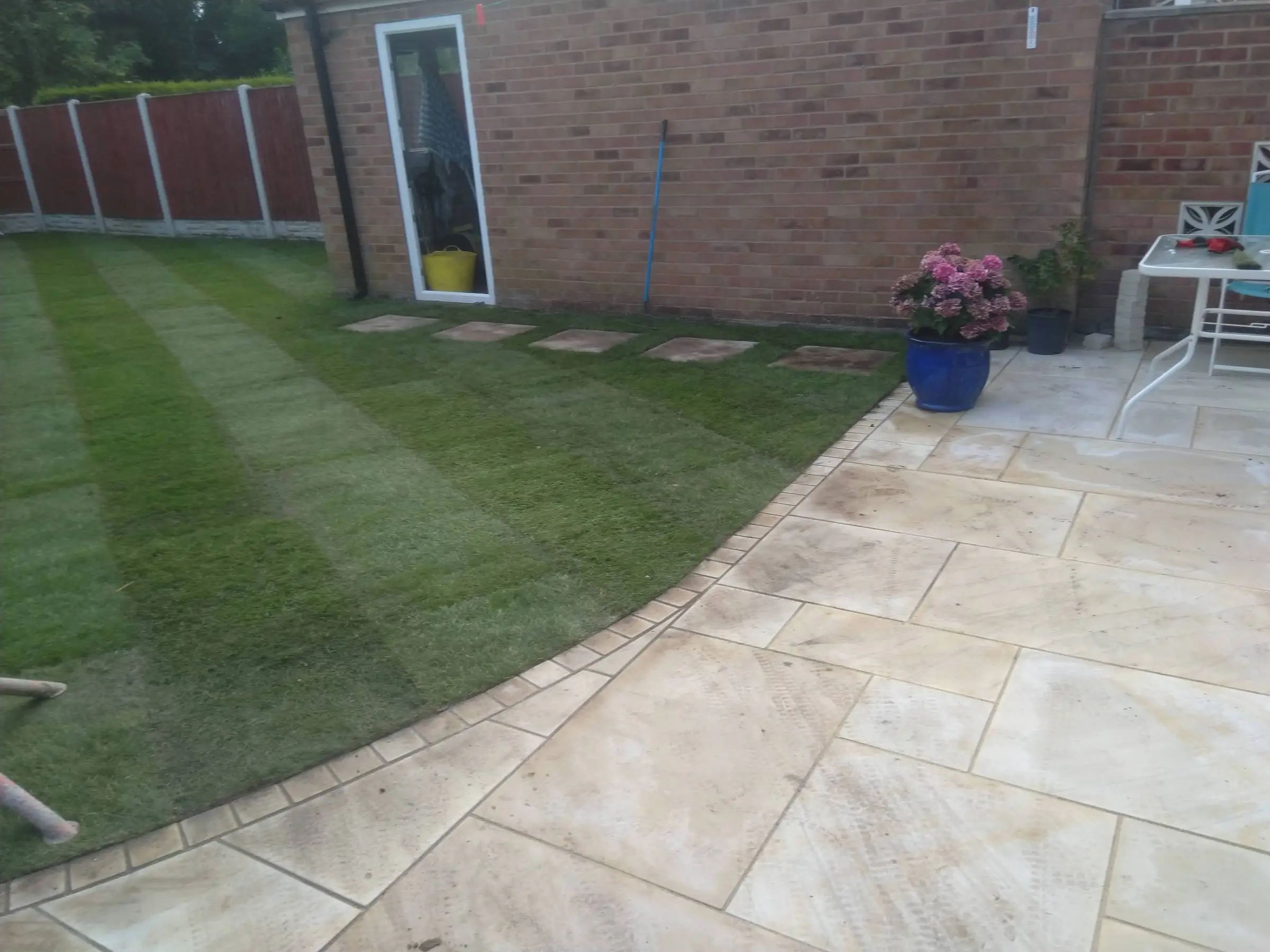 Cream Indian honed sandstone patio and lawn