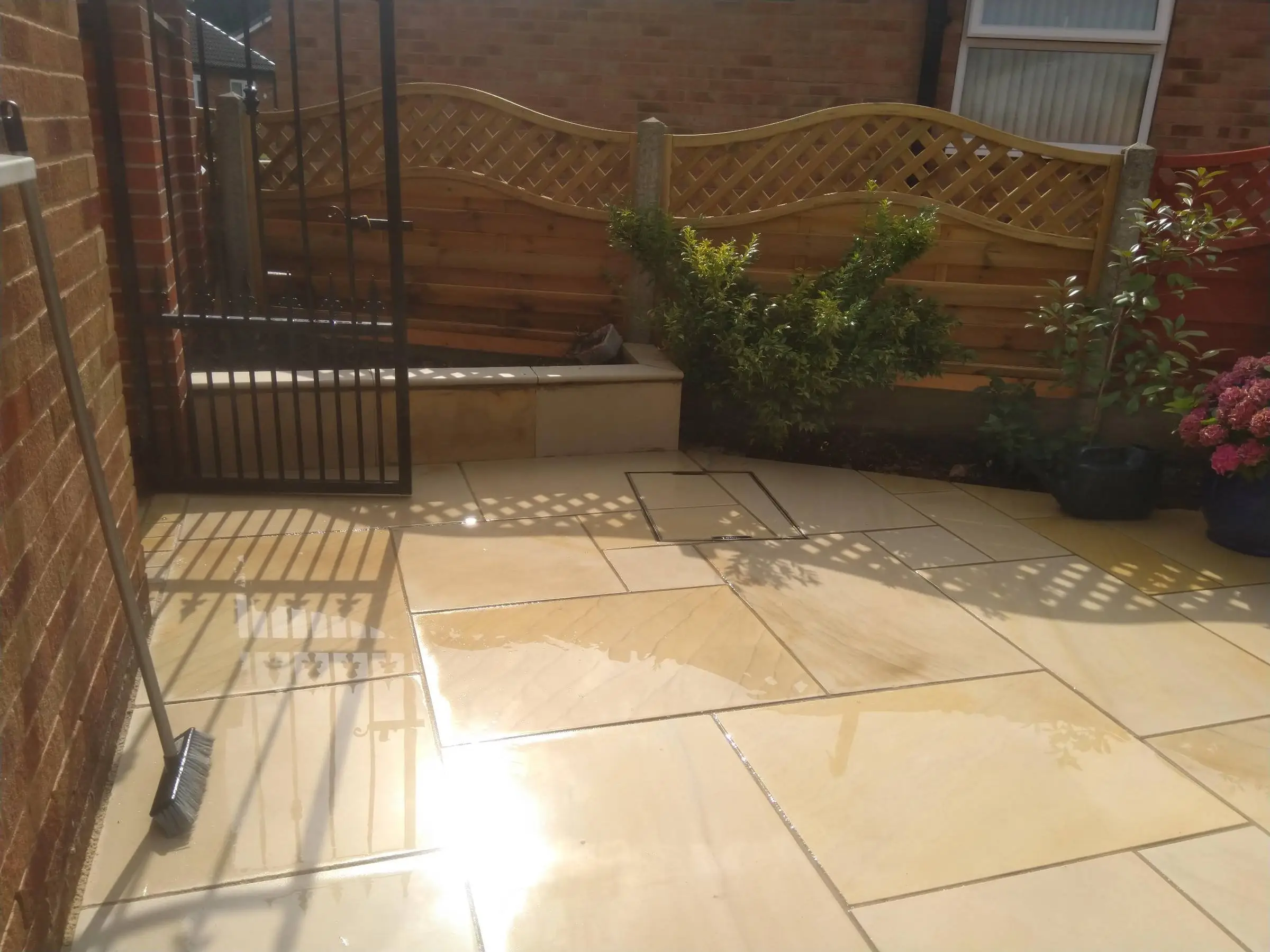 Cream Indian honed sandstone patio and lawn